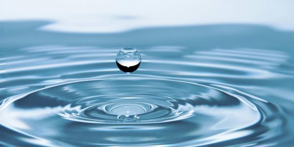 drops-of-water-water-nature-liquid-40784-40784 A mesmerizing shot of a water droplet capturing the beauty of liquid dynamics.